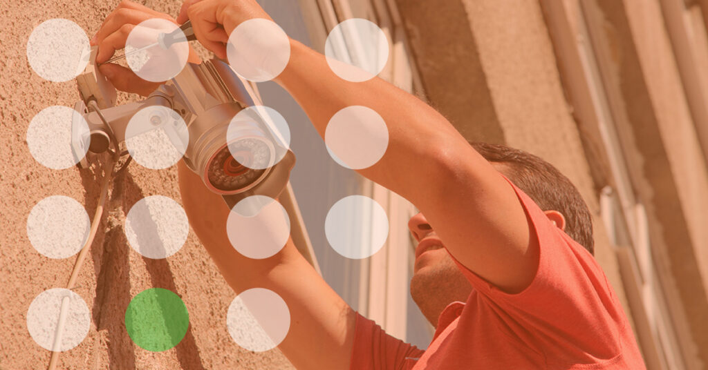 Man Working on Security Camera