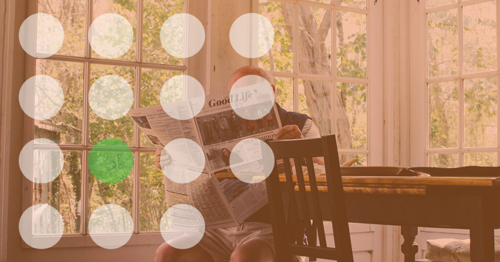 Man Reading Newspaper