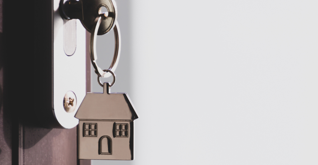 Image of a key in the door