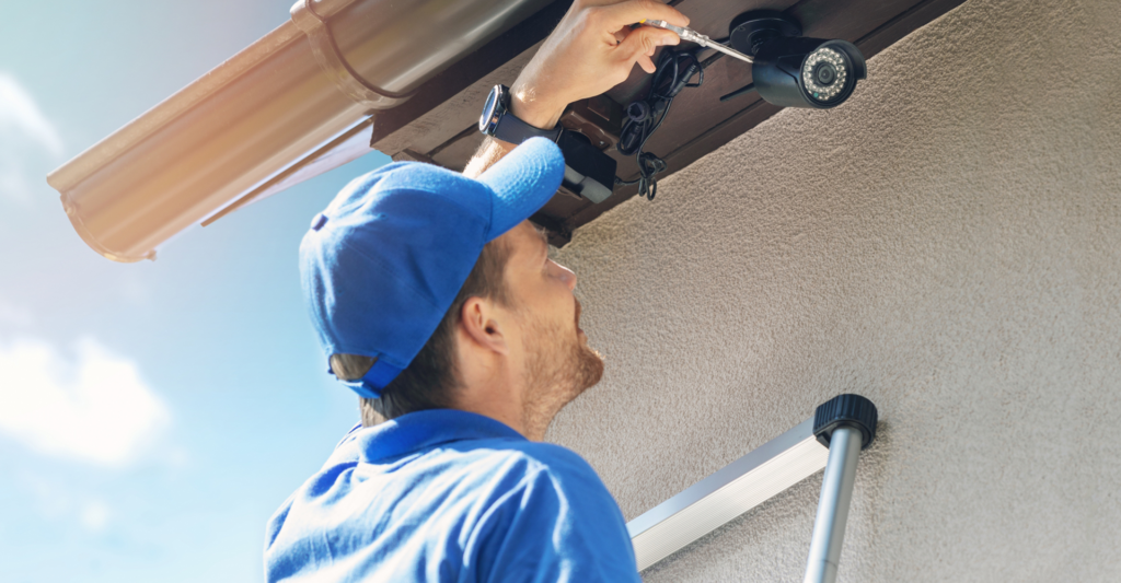 Image of someone installing a camera
