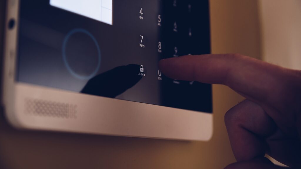 Man alarming home security system