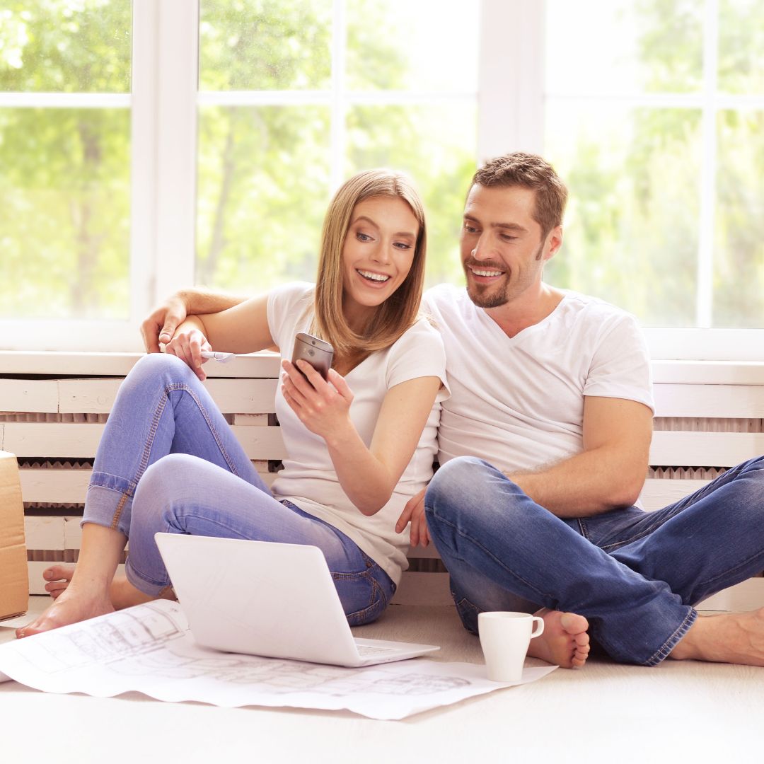 couple sitting safely in their home
